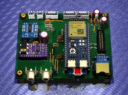 PCB with ESP32 module and electronic components.