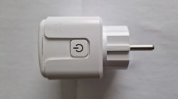 Smart Plug with Power Button White smart plug with a power button on the side.