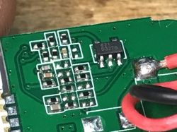 Close-up of 621 D3278 Chip on a Circuit Board Close-up of a printed circuit board with a 621 D3278 chip and soldered wires.