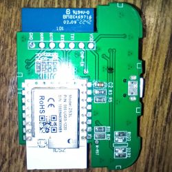 Green PCB with ZS3L module and labeled pads GND, RX, TX1, VDD on a wooden surface