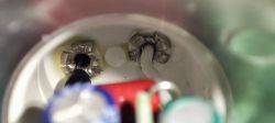 Inside of a Modified GU10 Bulb Interior of a GU10 bulb socket with visible wire soldering.