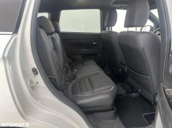View of a car interior from the back seat.