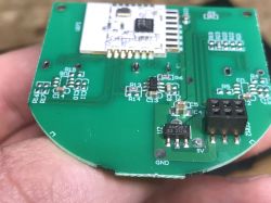Close-up of SmartLED 8044 PCB with AMS1117 and pin header Close-up of a PCB with AMS1117-3.3V voltage regulator and a pin header, detailed view.