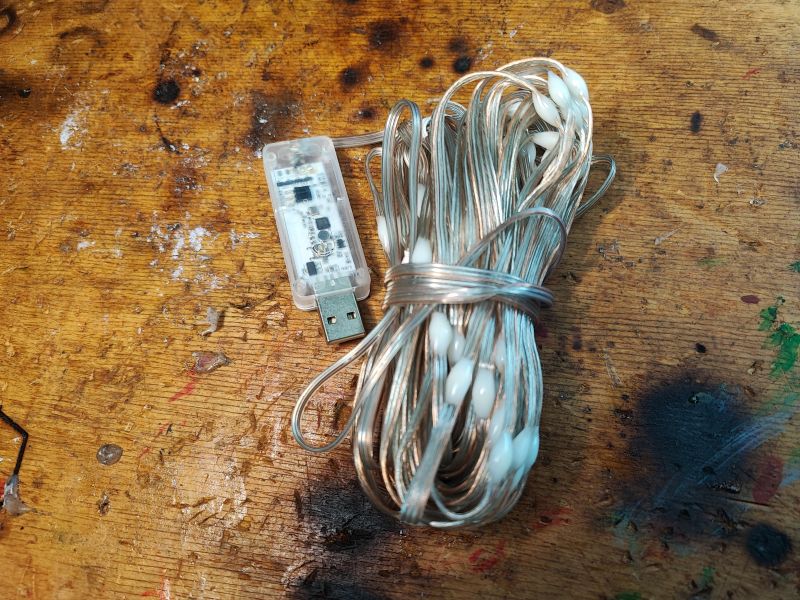 WS2812 LED Strip with USB Controller WS2812 LED strip and controller on a workbench