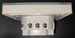 Currysmarter Gen6 Curtain Switch - Side View Side view of the Currysmarter Gen6 modular curtain switch with a white glass frame and four mounting screws.