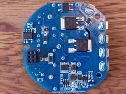 Blue Printed Circuit Board with Components Close-up of a blue printed circuit board with electronic components.