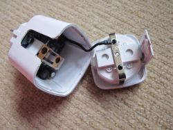 Interior of EU Smart Plug Opened interior of an EU smart plug with visible electronic components.