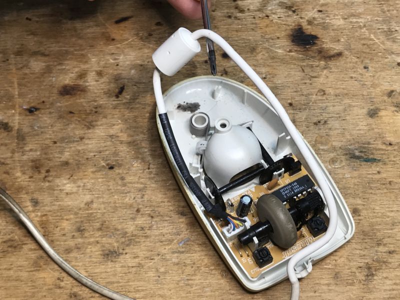 Inside View of an Old Ball Mouse Inside view of an old ball mouse with an opened casing.
