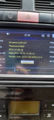 Car multimedia system screen displaying information about Bluetooth name and software version.