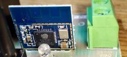 ESP8285 module with visible electronic components.