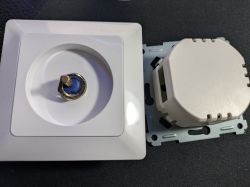 Dismantled LSC Connect Smart Dimmer Dismantled LSC Connect smart wall dimmer with visible components.