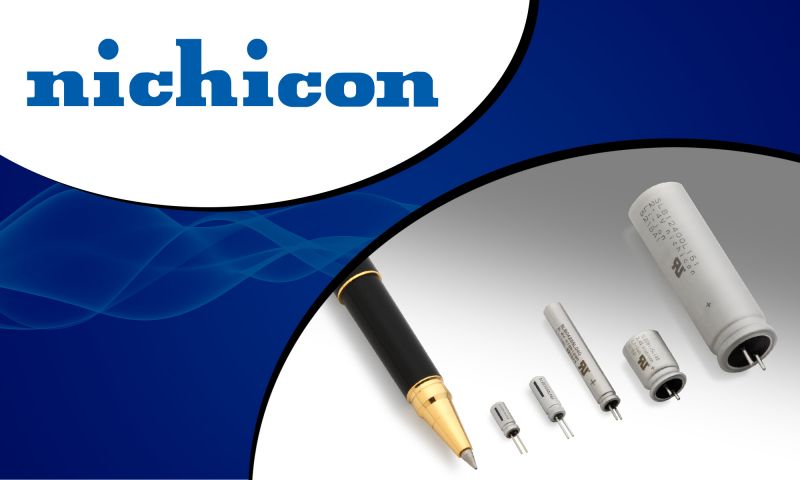 Nichicon logo and various capacitors next to a pen.