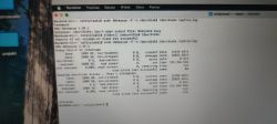 Terminal na MacBooku z wynikami narzędzia ddrescue dla dysku twardego 1 TB
