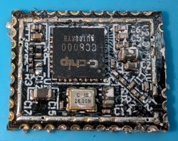Close-up of a CC8000 module with visible components on a circuit board.