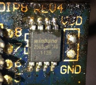 Winbond 25032FVSIG chip on a PCB marked with GND and LED