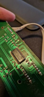 TM1628 Integrated Circuit on a Printed Circuit Board Close-up of TM1628 integrated circuit on a printed circuit board.