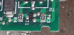 Close-up of a circuit board with a component labeled C603 in the top left corner.