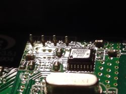 LT8910S Integrated Circuit on Circuit Board Close-up of a circuit board with an integrated circuit labeled LT8910S.