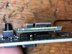 Close-up of an electronic circuit with an exposed module.