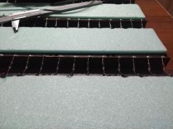 Battery Modules on Foam Substrate The image shows battery modules on a foam substrate.