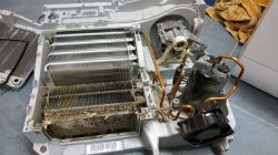 Worn cooling system with visible dirt buildup.
