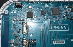 Image of a circuit board with visible chips and electronic components.