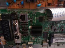 A circuit board with various ports and connectors.
