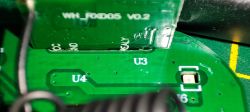 Circuit Board with WH_RXD05 V0.2 Module Close-up of a circuit board with WH_RXD05 V0.2 module showing pin labels.