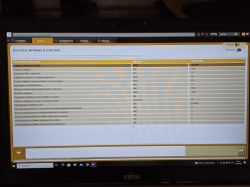 Zrzut ekranu z diagnostyki samochodowej, pokazującej parametry związane z filtrem cząsteczek w laptopie Fujitsu.
