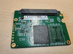SSD Goodram CX400 256 GB PCB with visible chips and SATA connector
