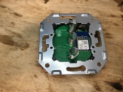 Internal Circuit Board of Avatto N-TS10-EU-B3 Light Switch Avatto triple light switch circuit board with mounting elements and CB3S module visible.
