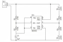 Electronic schematic with NE555 timer, two LEDs and associated resistors and capacitor