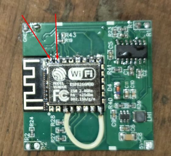 ESP8266MOD module on PCB with red arrows pointing to specific GPIO pins