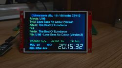 LCD screen displaying audio playback info and technical parameters