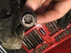 Unscrewing Screws from Brake Yoke: Step-by-Step Guide for Citroen Berlingo Brake Disc Replacement Unscrewing Screws from Brake Yoke: Step-by-Step Guide for Citroen Berlingo Brake Disc Replacement