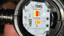 Close-up of a circuit board with LEDs and resistors.