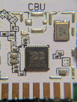 Circuit Board with BK7231N Chip Close-up of a circuit board with a Bekin BK7231N chip and 26 MHz quartz resonator.