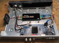 Samsung 870 EVO 4TB SSD mounted inside modified electronic device case