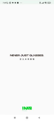 Ekran startowy aplikacji INMO z hasłem „NEVER JUST GLASSES” i logotypem firmy.