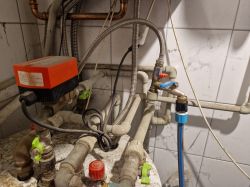 Pipe System with Valves and Pump Pipes and valves in a heating system.