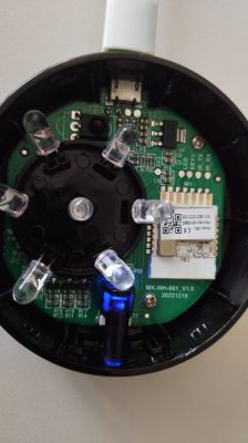 View of the interior of a round electronic device with visible LEDs and a CBU module.