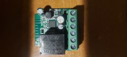 Close-up of a smart switch with BK7231 chip on a circuit board.