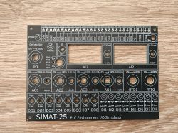 SIMAT-25 Simulator Front Panel Front panel of the SIMAT-25 simulator with printed descriptions of inputs and outputs.