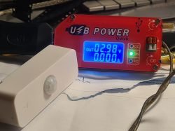 USB Power Quick board and PIR motion sensor on a desk.