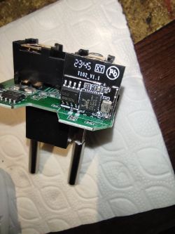 Close-up of an electronic socket board with RTL8710BX and BL0937 chips.