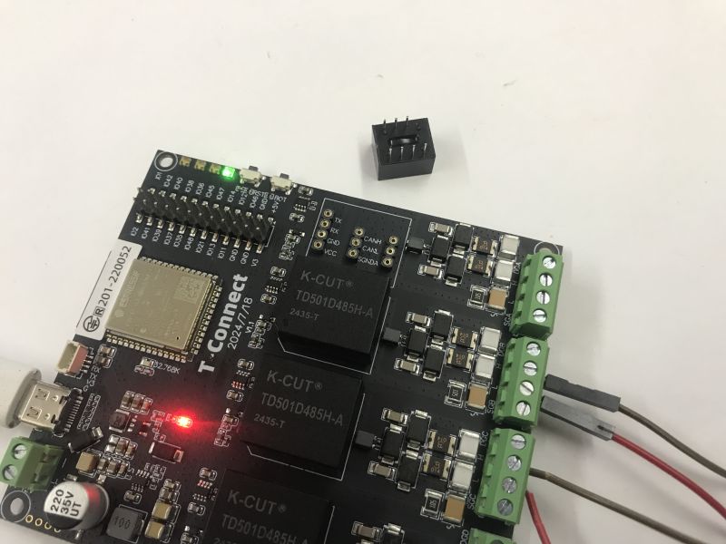 LilyGO T-Connect board with ESP32-S3, RS485/CAN screw terminals, and lit status LEDs