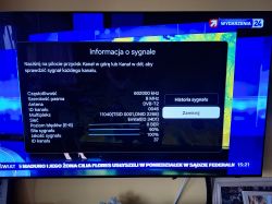 Menu informacji o sygnale DVB-T2 na ekranie telewizora z parametrami technicznymi.