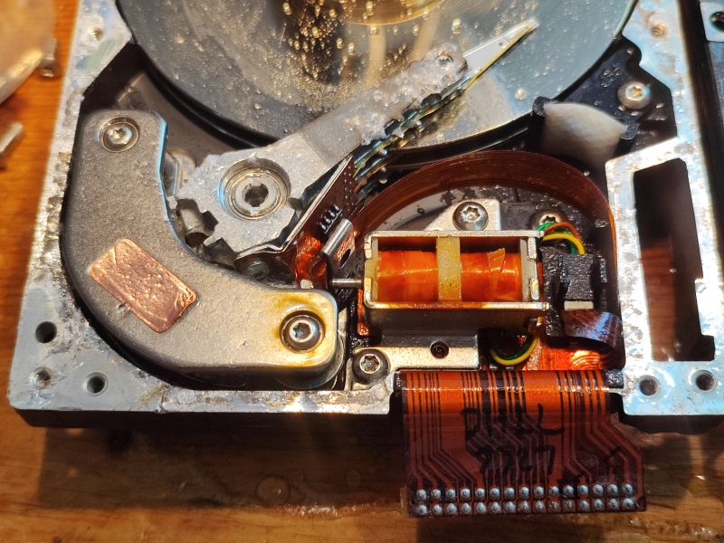 Interior of a Water-Damaged Hard Drive Interior of a hard drive showing signs of moisture