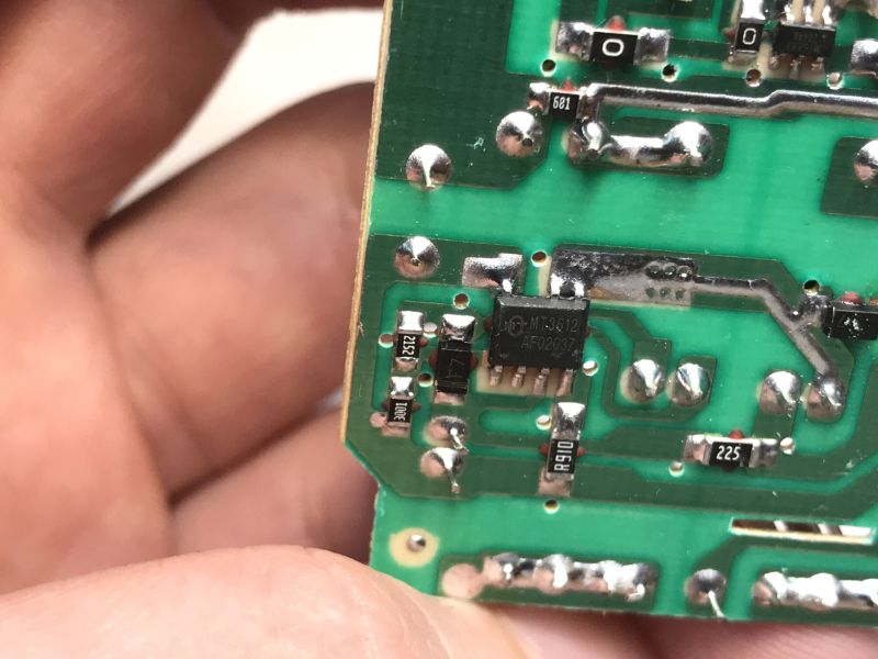 Close-up of MT3612 chip on a power supply PCB with SMD components