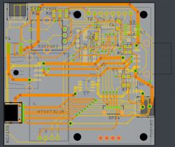 Projekt płytki drukowanej z zaznaczonymi ścieżkami i elementami elektronicznymi.